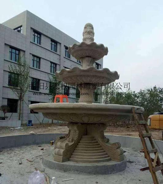 北京石雕喷泉安装实例_黄锈石欧式喷泉三层叠水