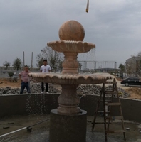 邯郸晚霞红石雕风水球大型厂区安装介绍